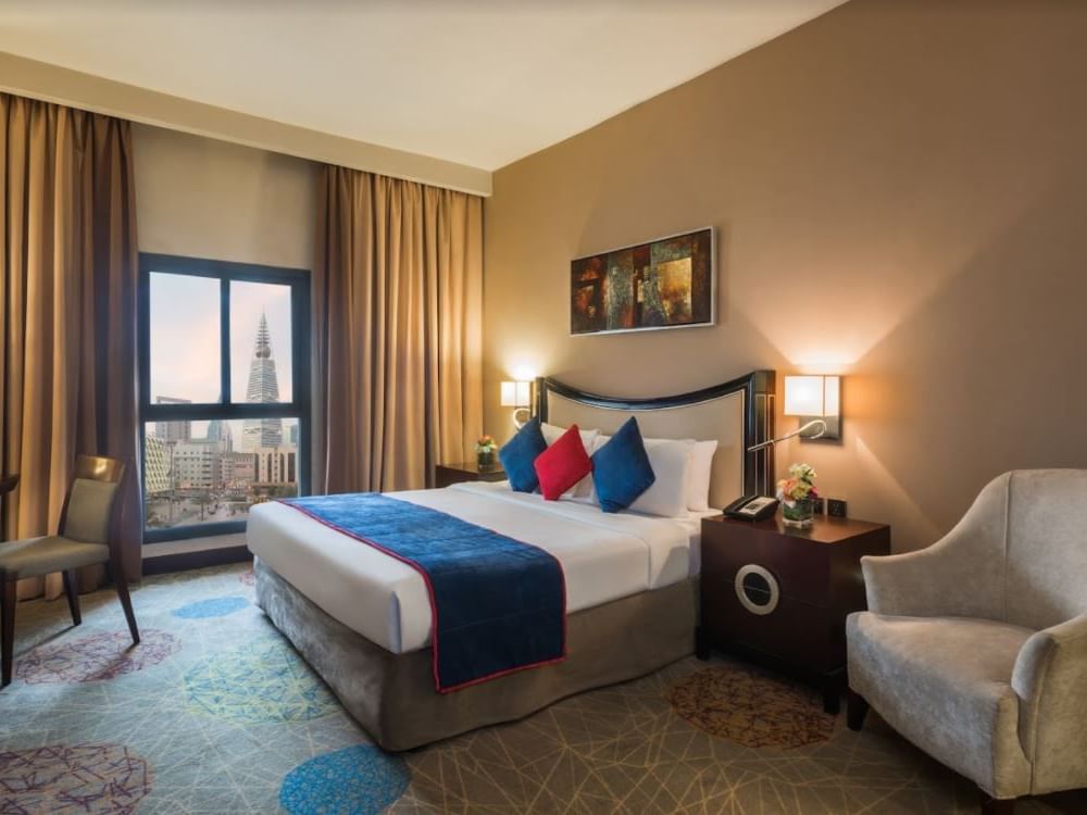 Interior of Executive suite with king bed at Mena Hotel Riyadh