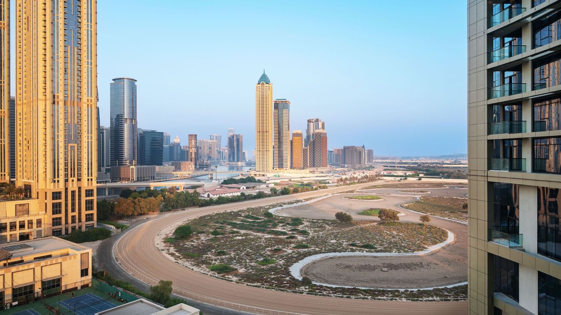 Distant view of Dubai's towering skyline near DAMAC Maison Aykon City Hotel Apartments