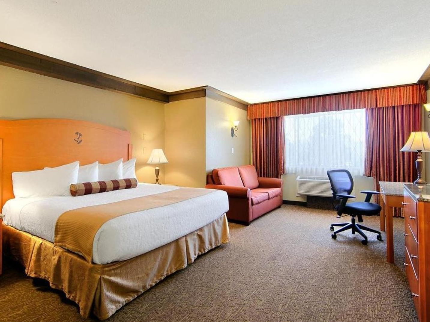 Interior of Deluxe King Room With Sofa-Bed at Abercorn Inn