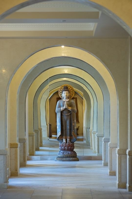 The Interior of Allegretto Vineyard Resort's arched walkways 