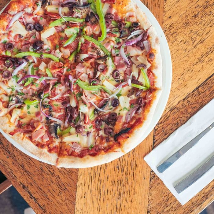 pizza from karinyas restaurant with delicious toppings