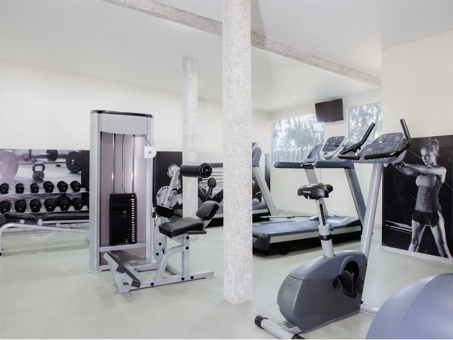 Exercise machines in the fitness center at Gamma Hotels