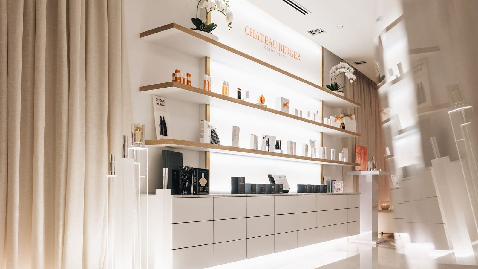 Modern and elegant Chateau Berger boutique at Paramount Hotel Dubai, displaying various beauty products on shelves