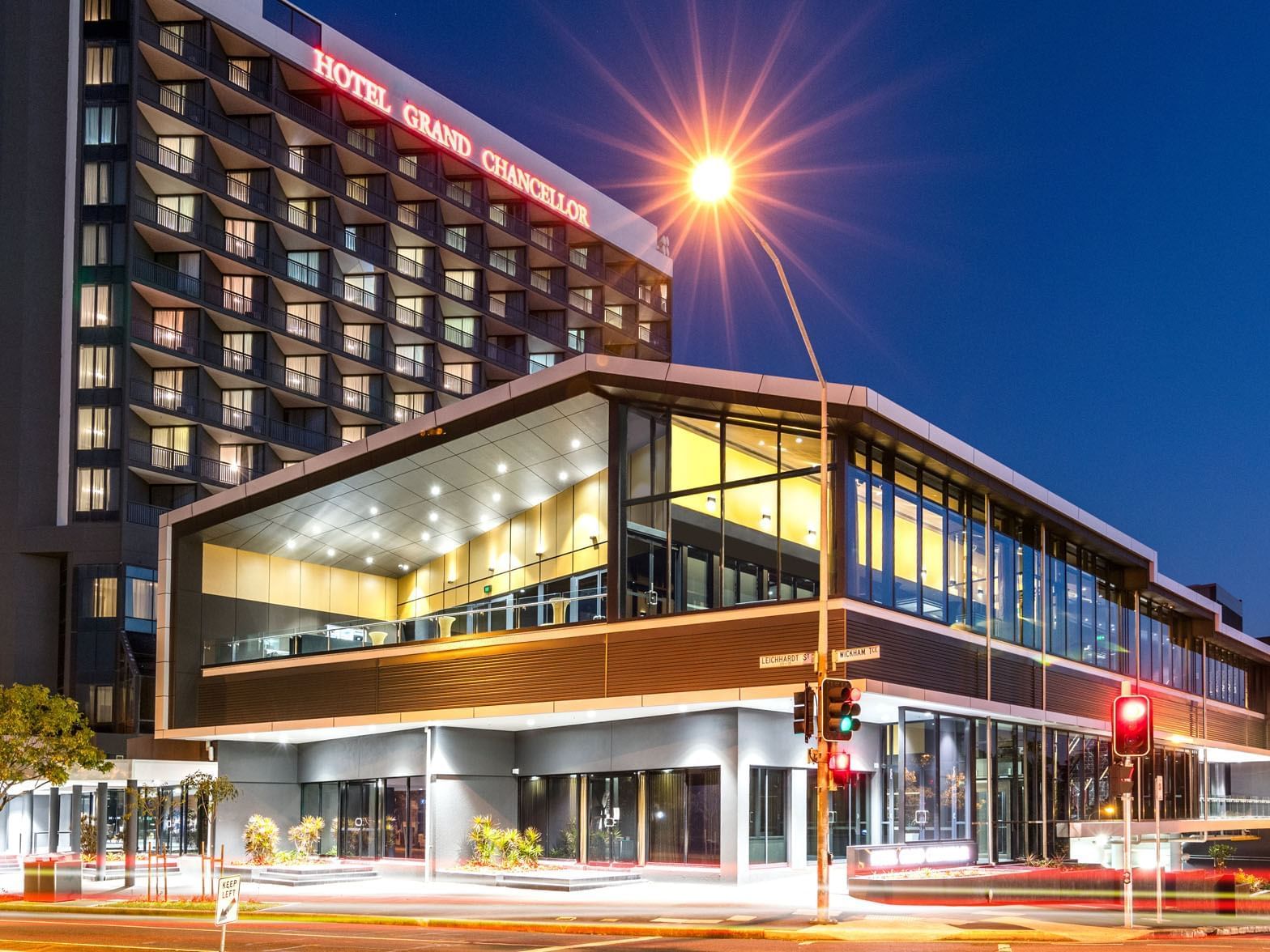 Exterior view of Hotel Grand Chancellor Brisbane captured at night