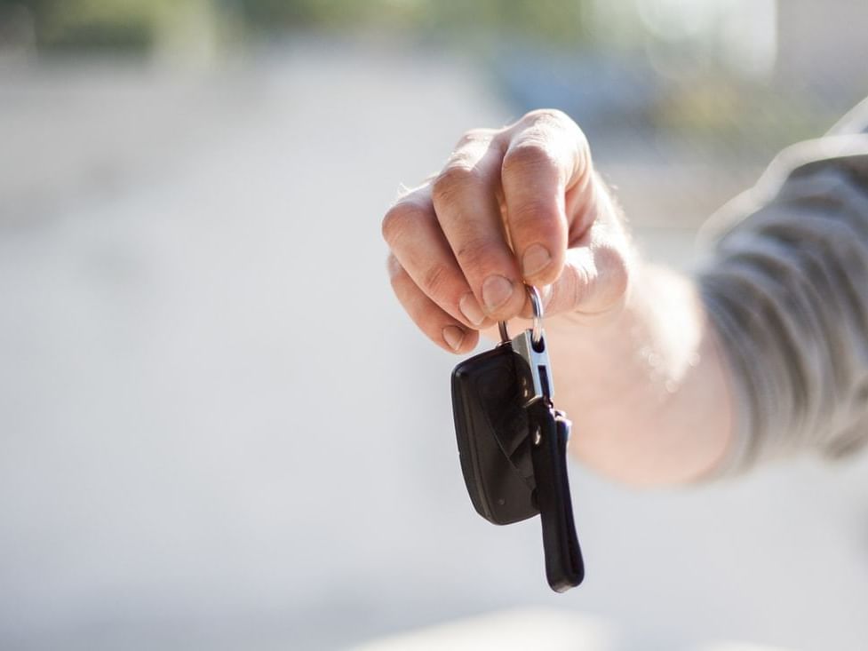 Businessman giving a car key at Paramount Hotel Seattle