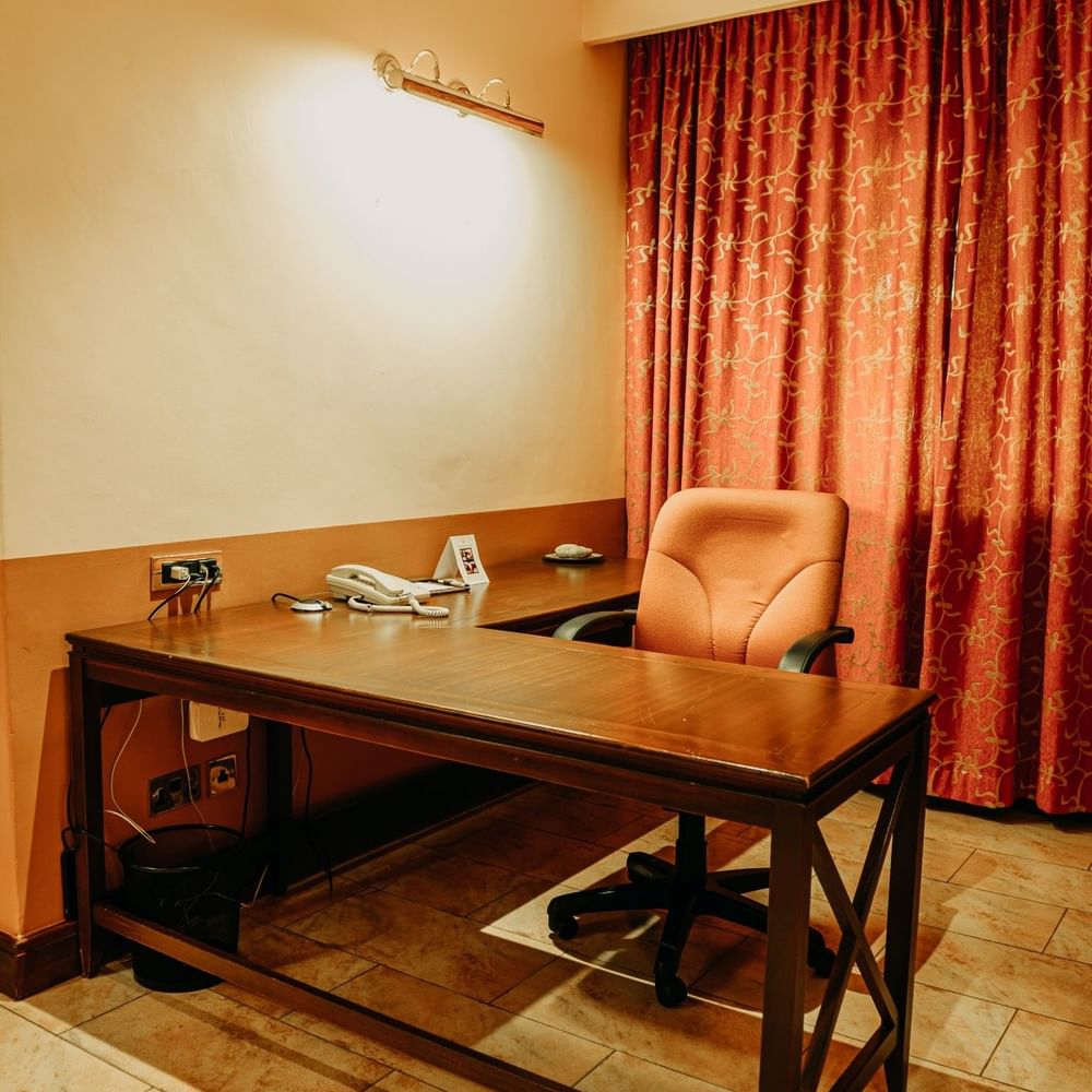 Desk and chair in a Presidential Suite at Lake Victoria Serena Golf Resort & Spa in Kampala.