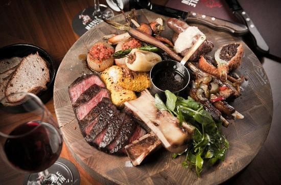 Meat platter served with wine, Nesuto Canberra Apartment Hotel