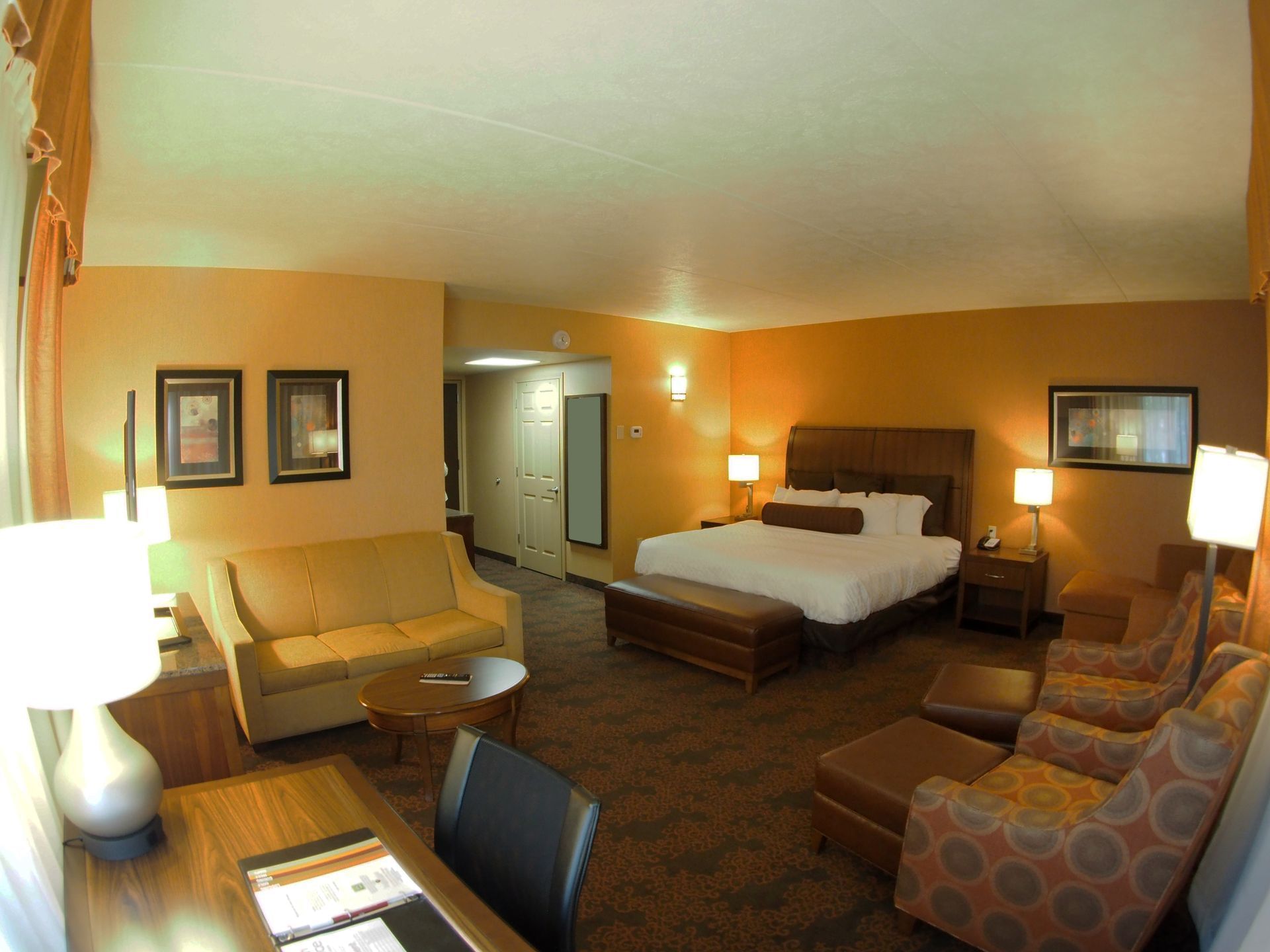 Junior Studio Suite with King Bed & 2 Sofa Beds at Evergreen Resort in Cadillac.
