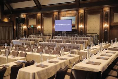 Rows of tables and chairs at a meeting in Stein Eriksen Lodge