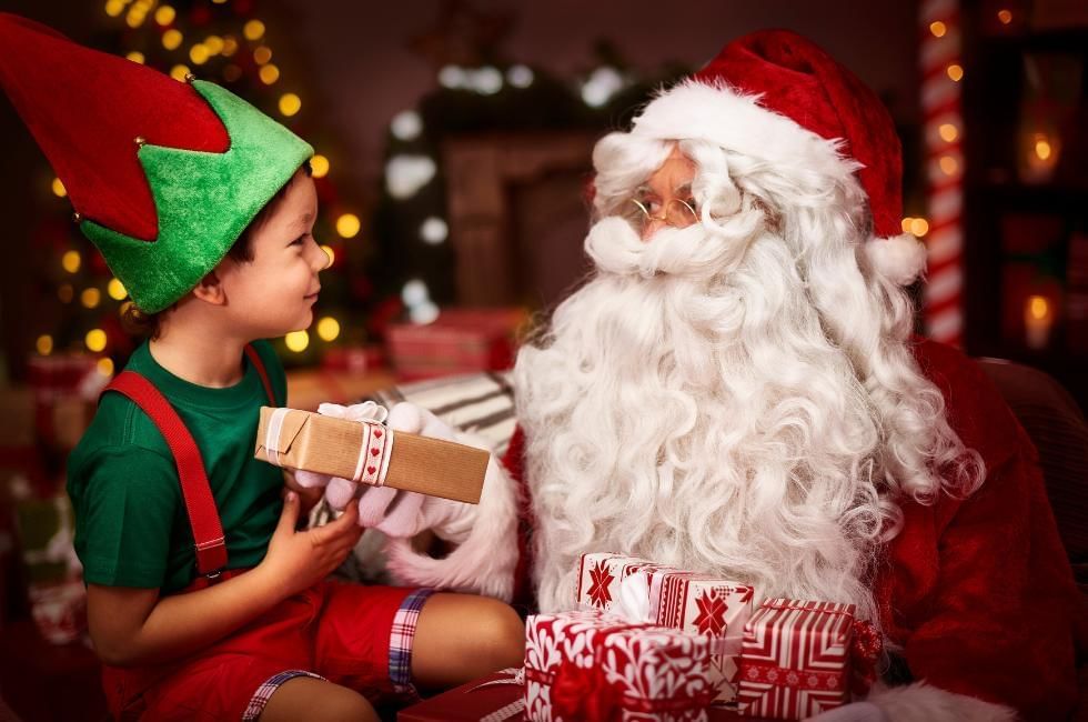 child sitting with santa