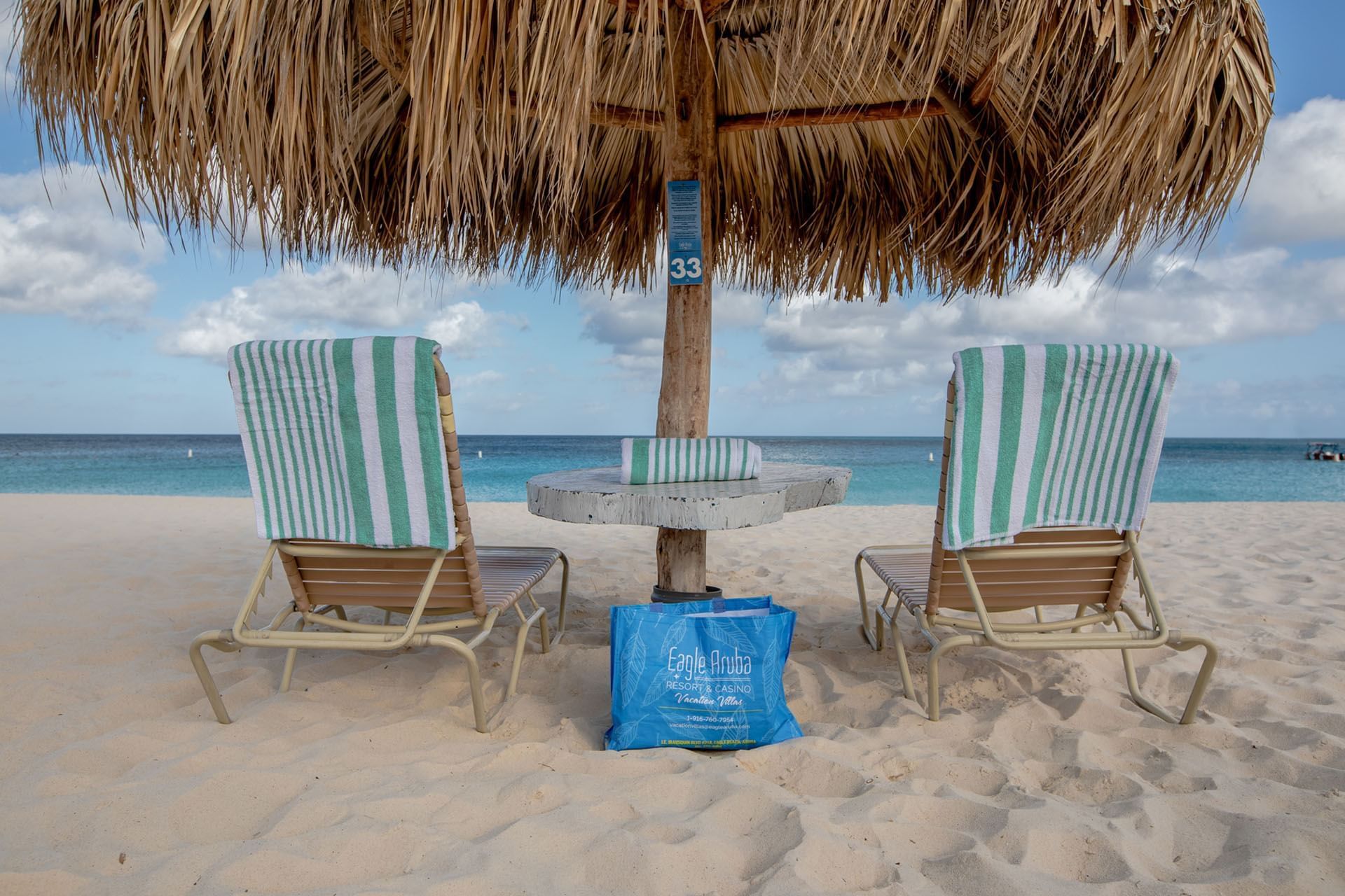 Closeup of a bamboo hut on the beach at Eagle Aruba Resort