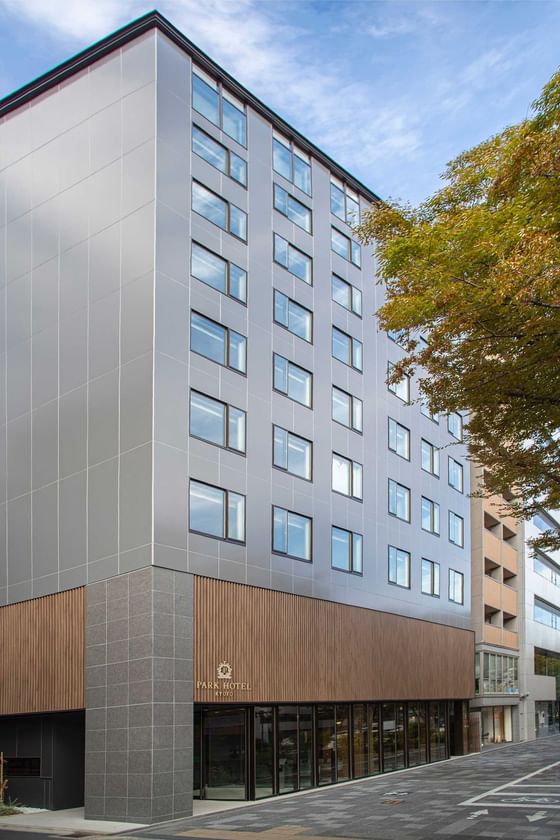 Street view of Park Hotel Kyoto with parking in front