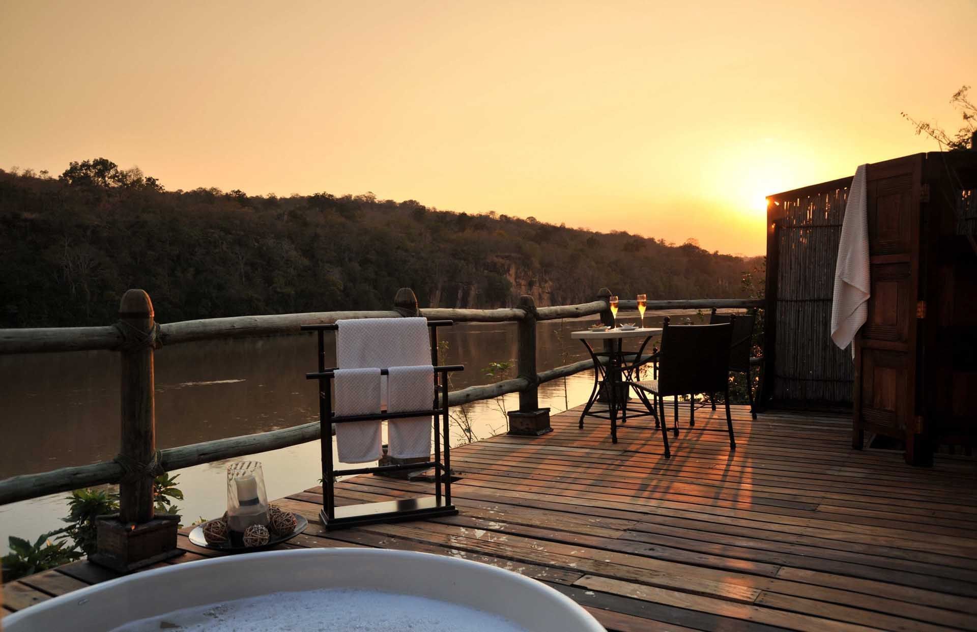 View from a hotel room balcony at Serena Mivumo River Lodge