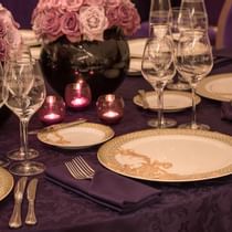 Casual dining table setup in a ballroom at Palazzo Versace