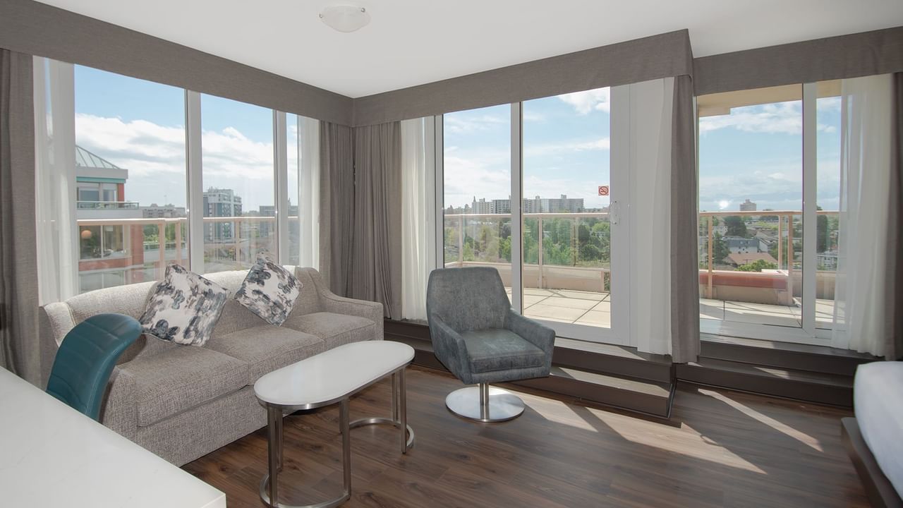 Hotel guestroom with couch and table