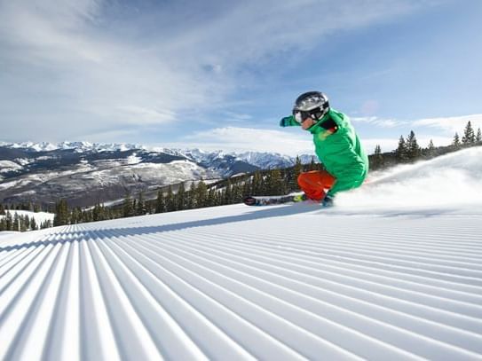 A skier in Intermountain Fis near Chateaux Deer Valley