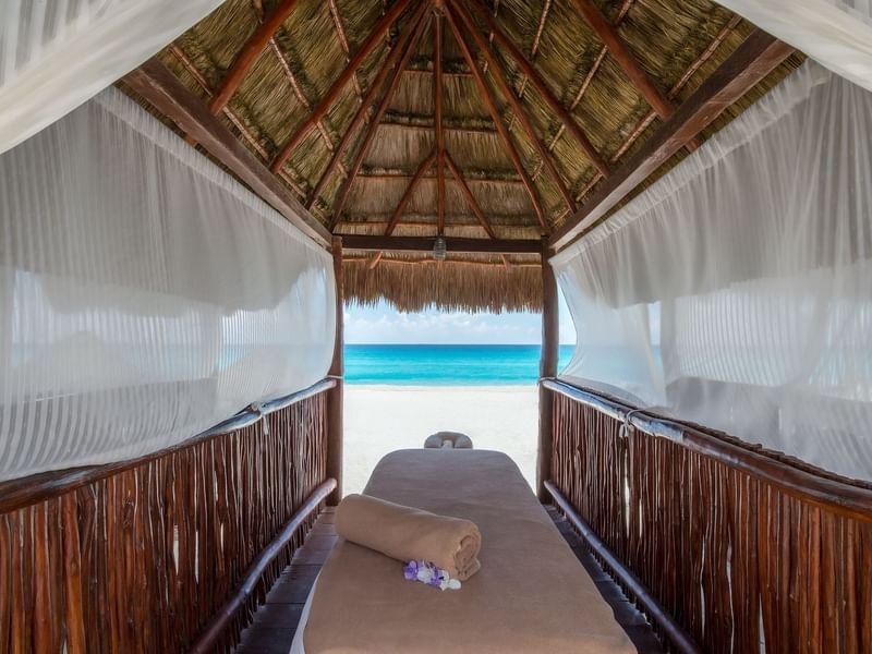 Beach hut with a spa bed at Fiesta Americana Cozumel