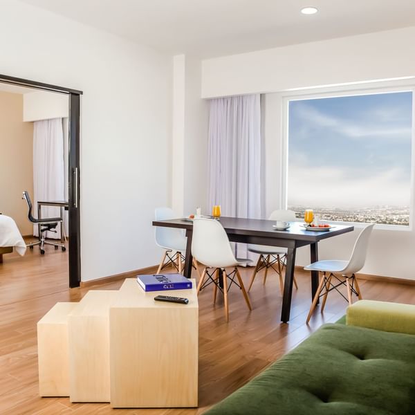 Interior of the living & dining room with view at Fiesta Inn