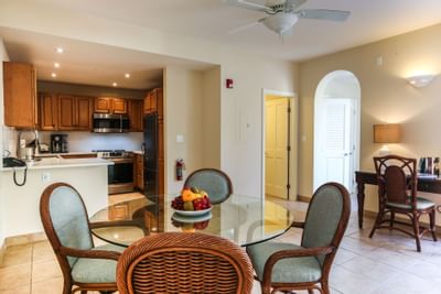 Dining area and kitchen in Island Suite at Windsong Resort On The Reef