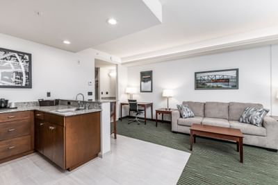 King Executive Suite River View with kitchenette, cozy sofa, and work desk at Off Shore Resort