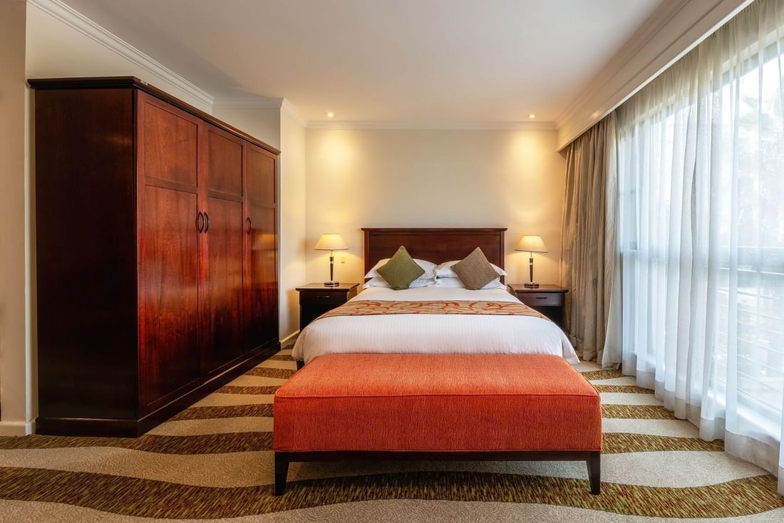 A standard guest room at Kigali Serena Hotel