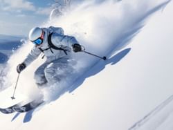 Man skiing on Cunningham's Ski Barn near High Peaks Resort