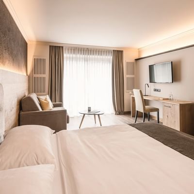 Camera familiare con giardino al Falkensteiner Hotel Falkensteinerhof a Valles.