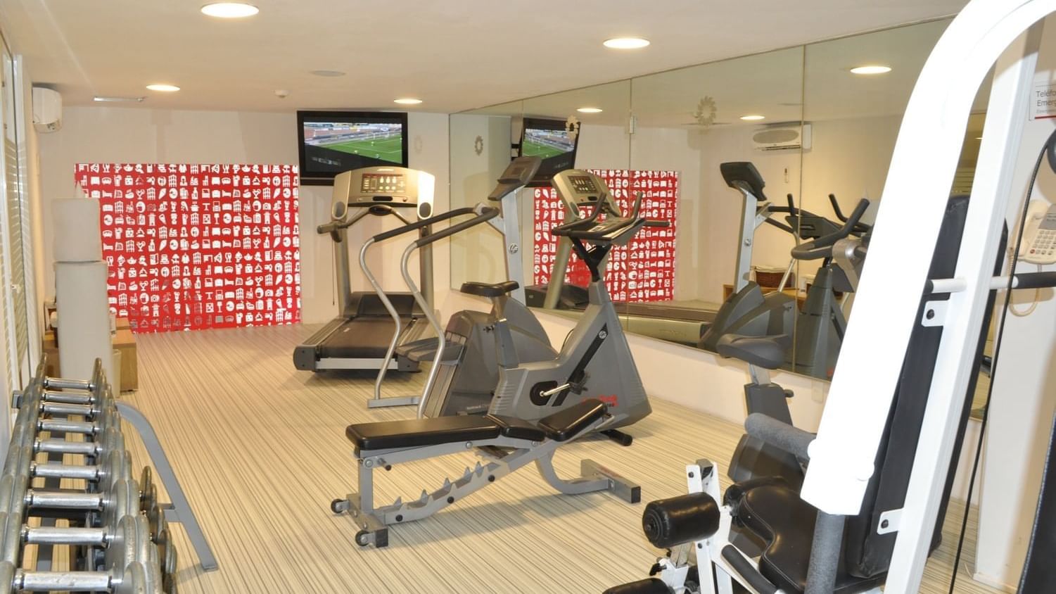 Fully equipped fitness center at Fiesta Inn Naucalpan