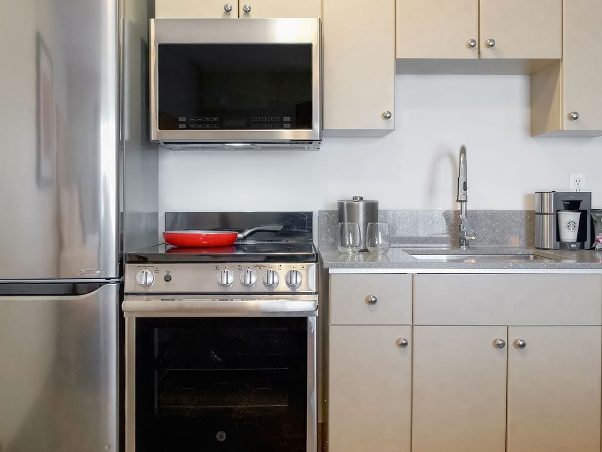 Stainless steel appliances in room