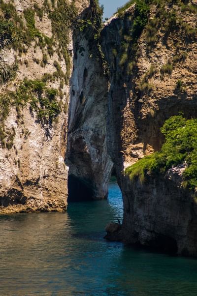 Rocky cliffs over the sea at Arcos Mismaloya near Villa Premiere Boutique Hotel & Romantic Getaway