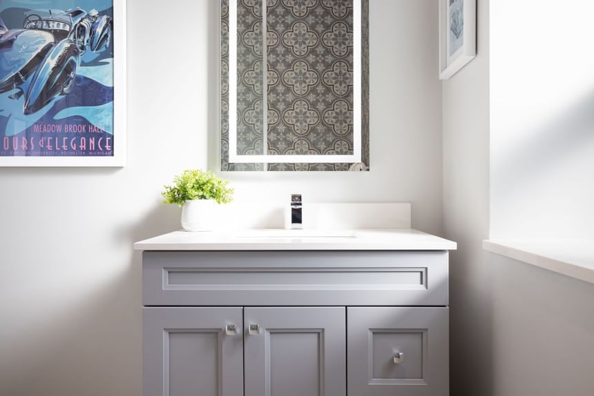 Mini plant with pot on side cupboard in King Premiere at Retro Suites Hotel