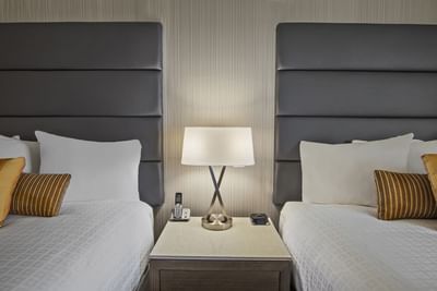 two beds in modern hotel room