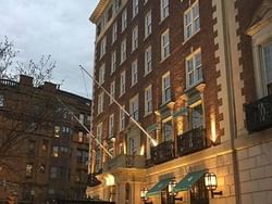 Exterior view of the hotel at The Eliot Hotel in the evening 