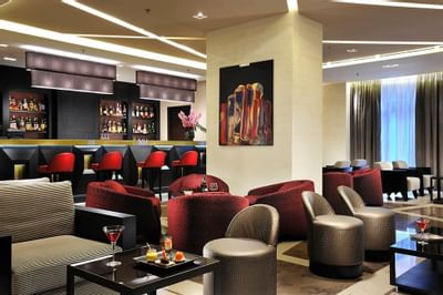 Lounge area & bar counter in Up Café at Uptown Palace in Milan