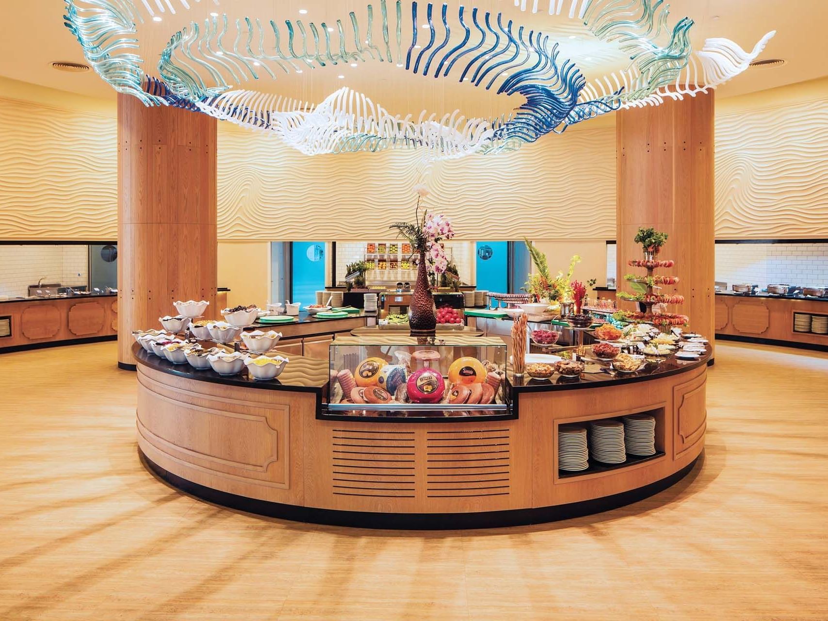 Foods displayed on the food counter in Parkfora Main Restaurant at Titanic Deluxe Lara