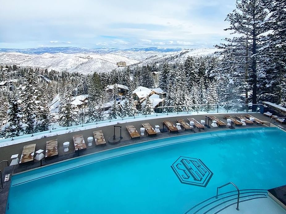 A view of the infinity pool with a wintery landscape