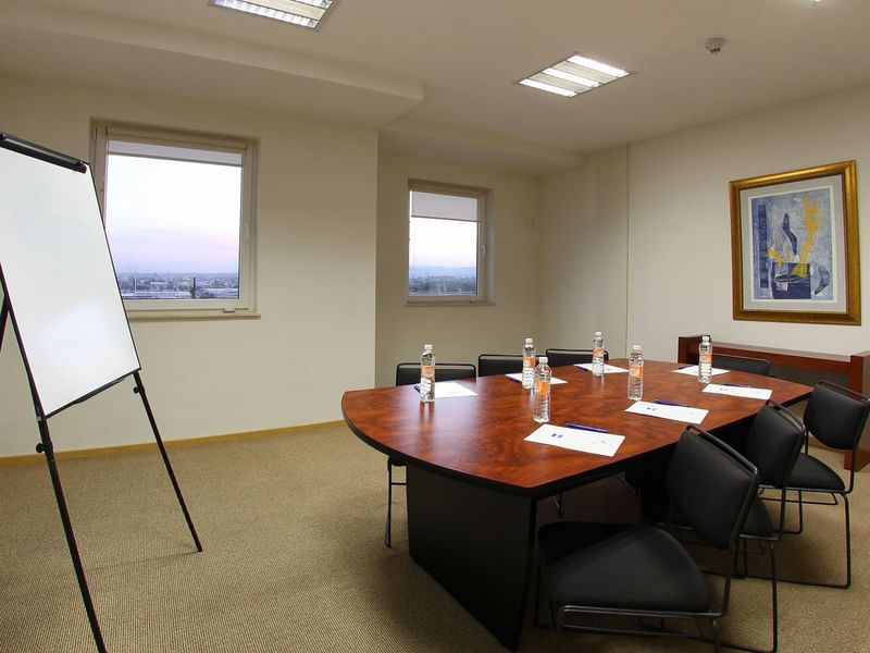Boardroom table & board in a Meeting Room at One Hotels