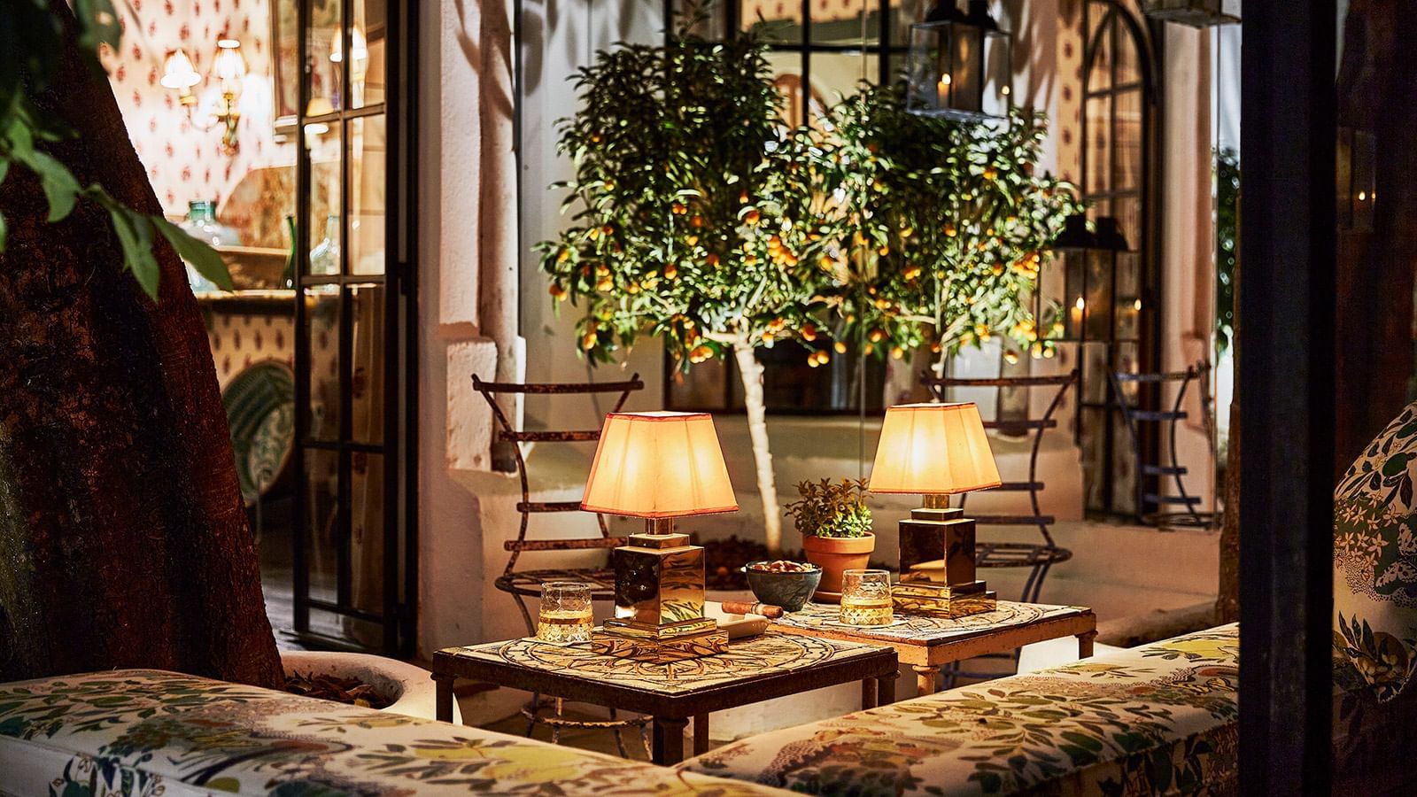 Lamps on tables at the lounge of the La Bodega at Marbella Club