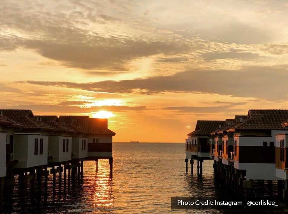 a view of Lexis PD water chalets with the sunset - Lexis PD