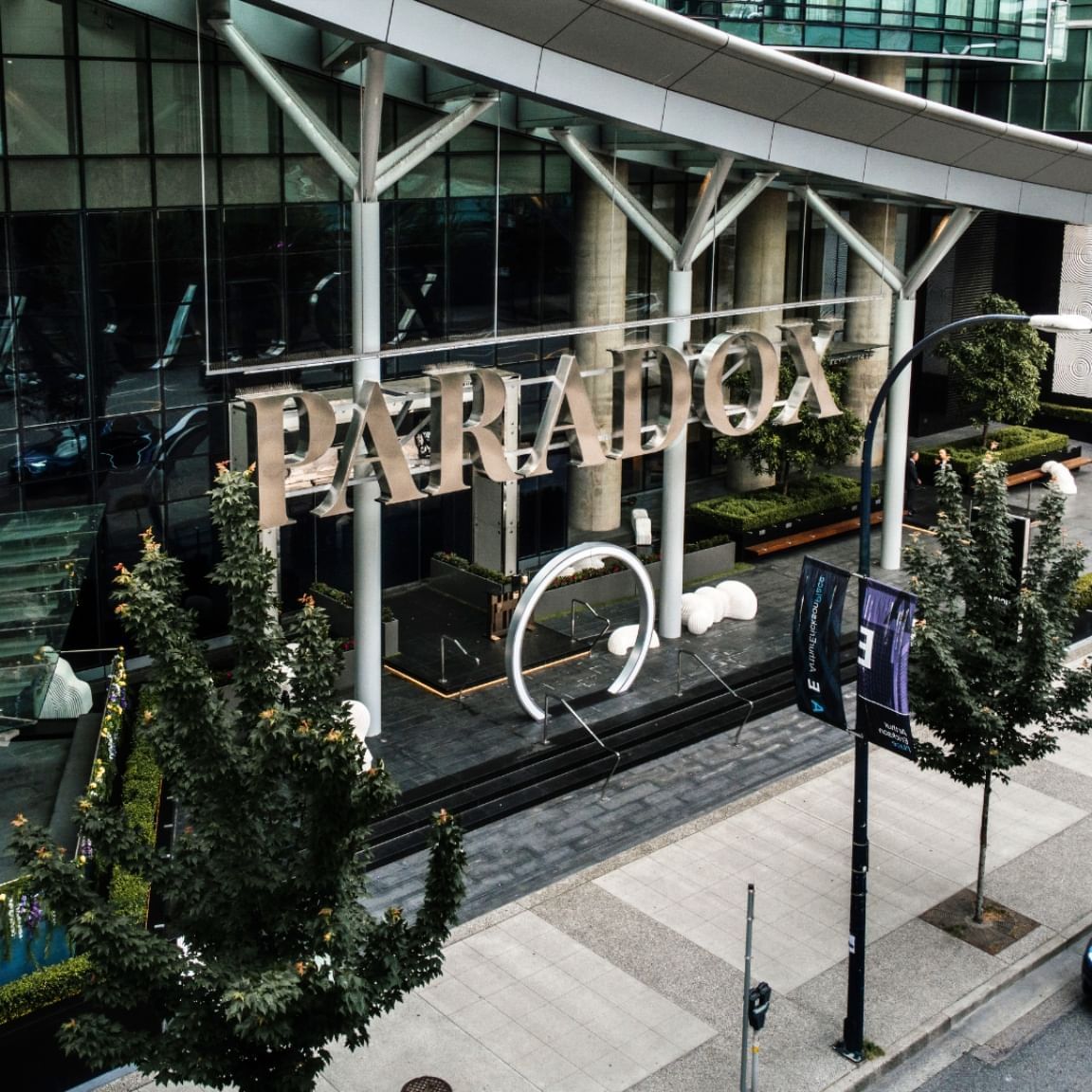Aerial view of the modern building of the Paradox hotel that received the 2023 Haute Grandeur Global Hotel Award.
