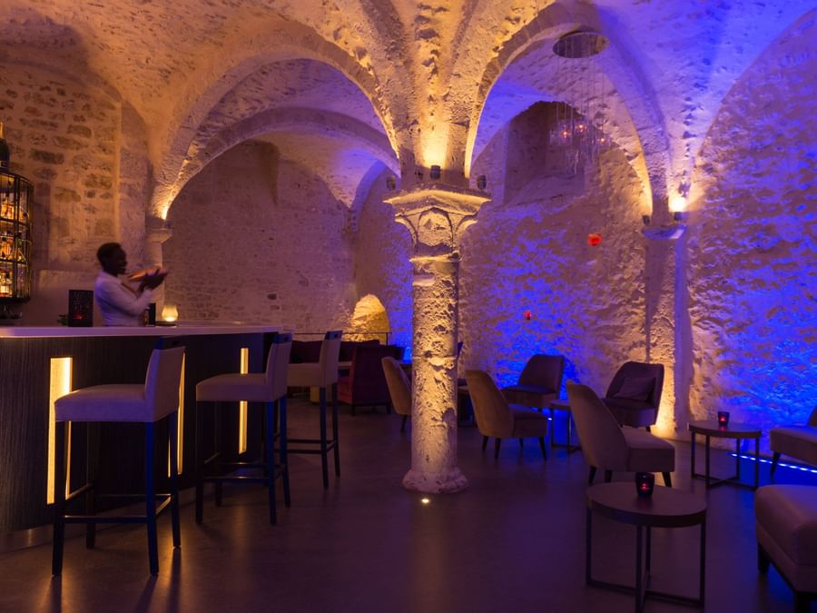 Interior of the bar &  seating area at Hotel Aux Vieux Remparts