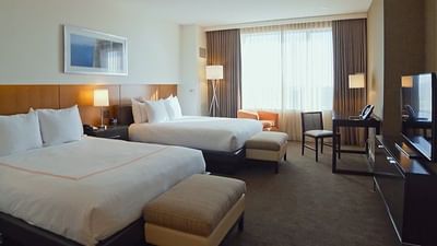 two beds in a hotel room