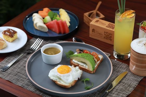 Close-up of breakfast meals served on a table at Hotel Rio Perdido