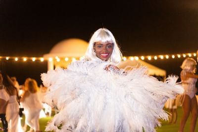 Lady with a feather dress, The Morgan Resort Spa Village