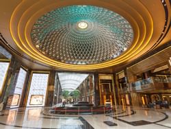 Grand ceiling decor of The Avenues Mall near The Regency Hotel