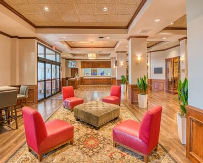 Interior of the lobby with lounges at at MCM Elegante Suites
