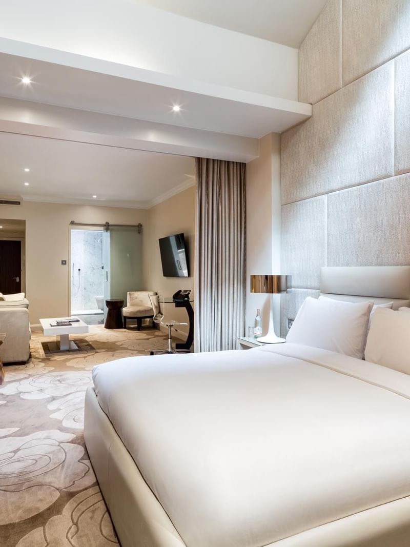 Interior of a room with king bed at The May Fair Hotel London