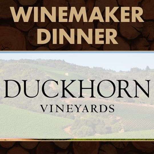Duckhorn logo with winery in background