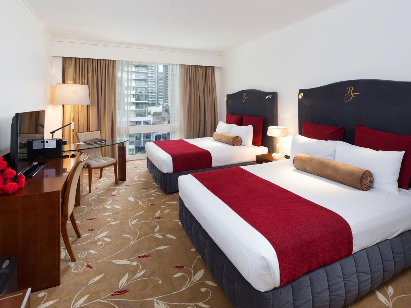 Deluxe City View Twin Room with two double beds at Royal on the Park hotel