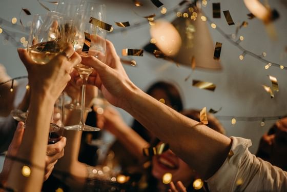 People toasting champagne & celebrating, Pelangi Beach Resort